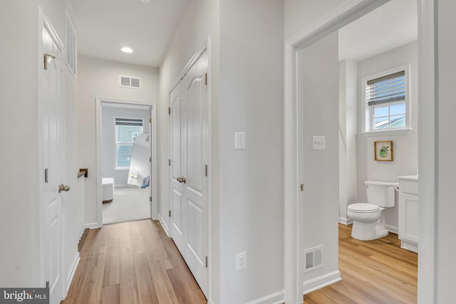 5992 Passend Dr, Frederick, MD 21703 - hallway with light wood-style floors, plenty of natural light, baseboards, and recessed lighting