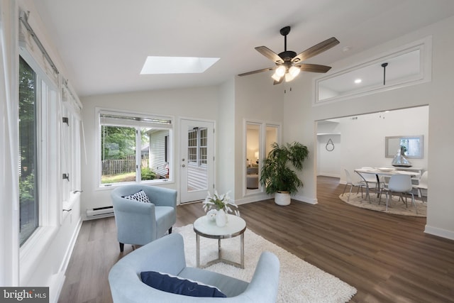 1806 Crofton Pkwy, Crofton, MD 21114 - living area featuring a baseboard radiator, a skylight, lofted ceiling, wood finished floors, and ceiling fan