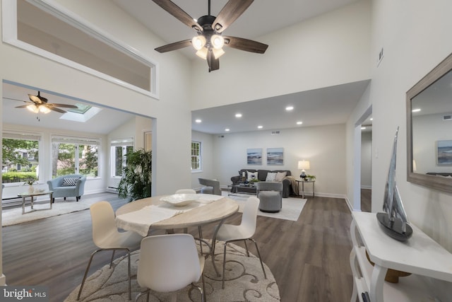 1806 Crofton Pkwy, Crofton, MD 21114 - dining space featuring ceiling fan, wood finished floors, a high ceiling, a skylight, and recessed lighting