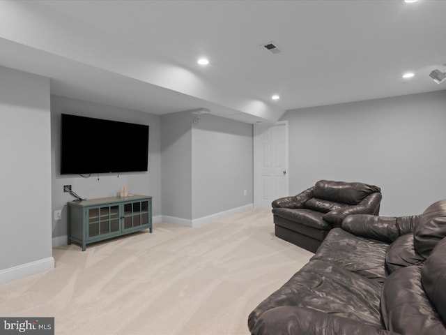 living room featuring light colored carpet, recessed lighting, and baseboards