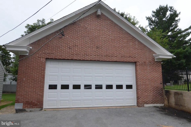 1709 Lampeter Rd, Lancaster, PA 17602 - garage featuring asphalt driveway