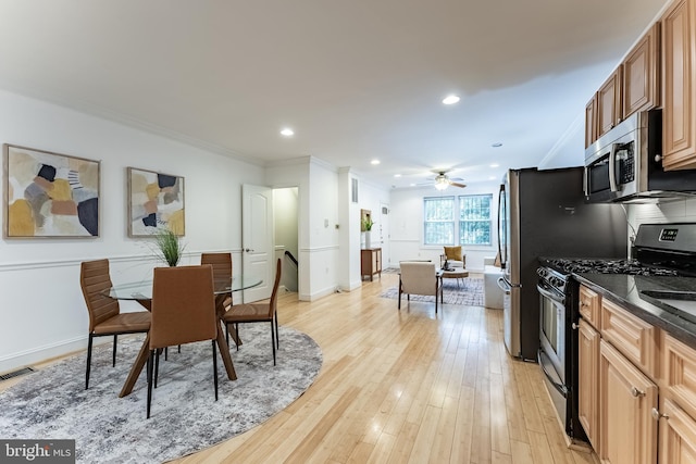 1840 D St NE Unit 1, Washington, DC 20002 - dining room featuring ceiling fan, crown molding, light wood-style floors, recessed lighting, and baseboards