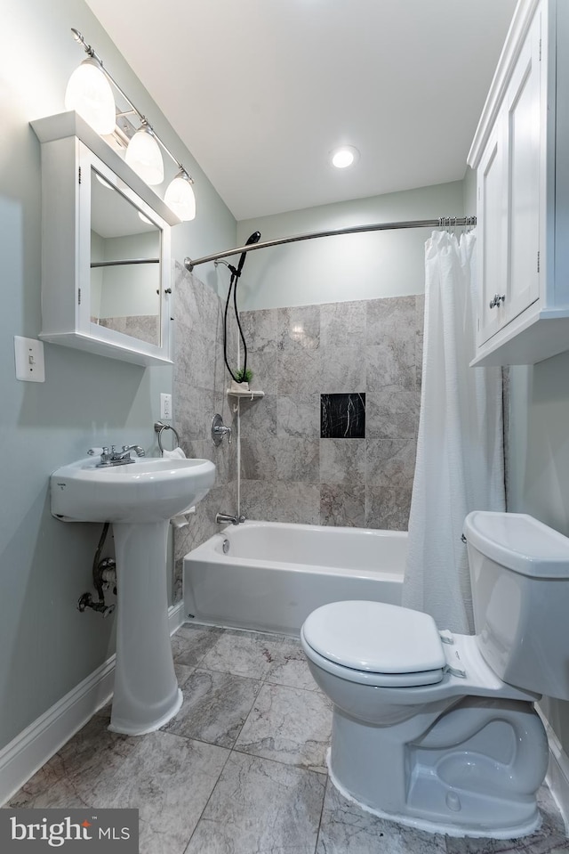 1840 D St NE Unit 1, Washington, DC 20002 - full bath with toilet, shower / bath combination with curtain, and baseboards