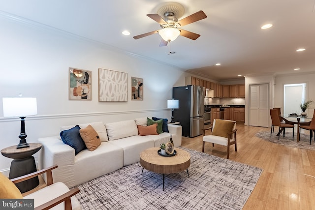 1840 D St NE Unit 1, Washington, DC 20002 - living room featuring ornamental molding, recessed lighting, light wood finished floors, and a ceiling fan