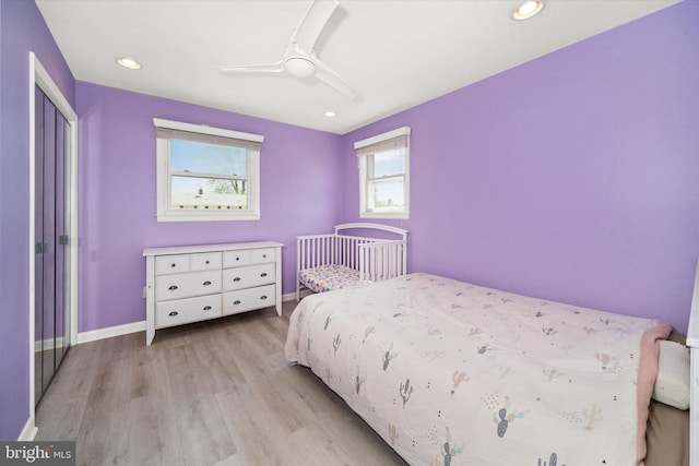 bedroom featuring light wood-style flooring, ceiling fan, recessed lighting, and baseboards