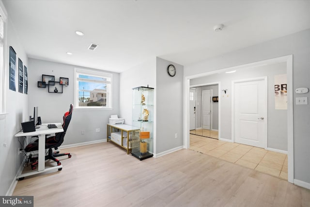 office space featuring wood finished floors, baseboards, and recessed lighting