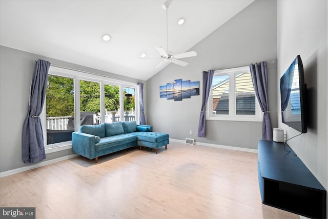 living area with wood finished floors, high vaulted ceiling, a ceiling fan, baseboards, and recessed lighting