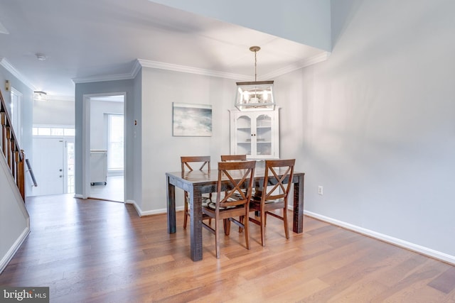 46919 Trumpet Cir, Sterling, VA 20164 - dining space with ornamental molding, wood finished floors, stairway, and baseboards
