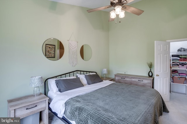 46919 Trumpet Cir, Sterling, VA 20164 - carpeted bedroom featuring a walk in closet and ceiling fan