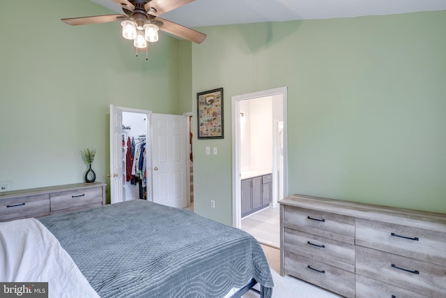 46919 Trumpet Cir, Sterling, VA 20164 - bedroom featuring a walk in closet, light colored carpet, connected bathroom, high vaulted ceiling, and ceiling fan