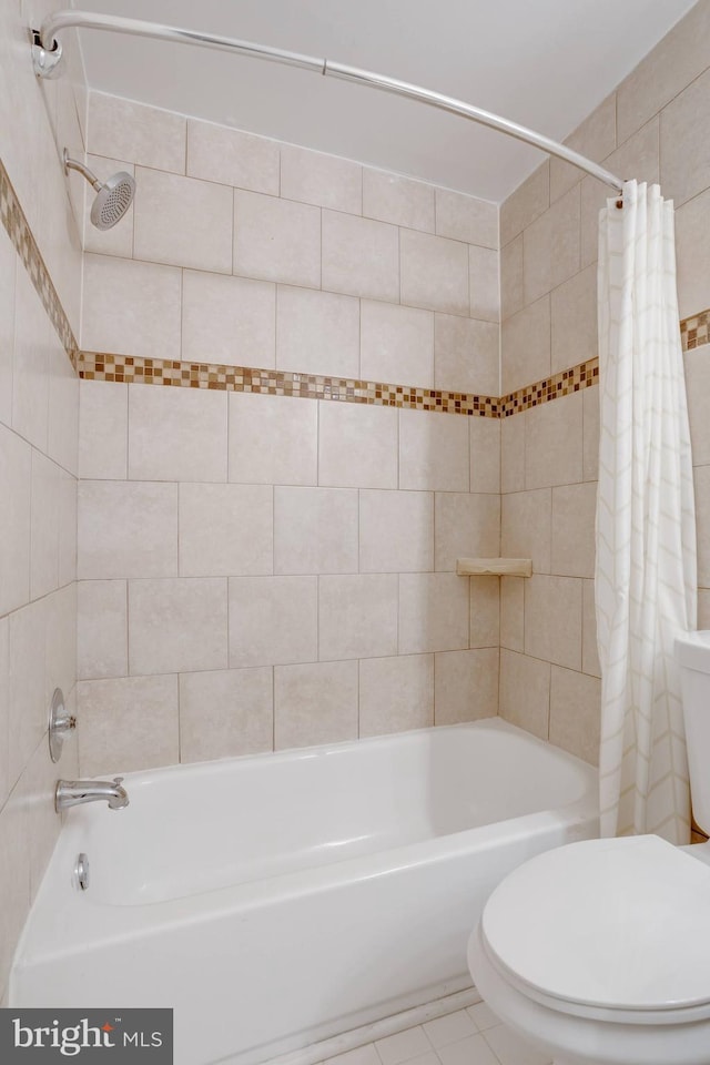 46919 Trumpet Cir, Sterling, VA 20164 - bathroom featuring toilet, shower / bath combo with shower curtain, and tile patterned flooring
