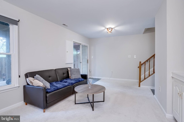 46919 Trumpet Cir, Sterling, VA 20164 - carpeted living room with stairway and baseboards