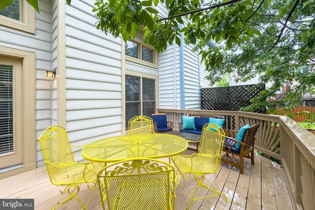 46919 Trumpet Cir, Sterling, VA 20164 - wooden deck featuring an outdoor living space and outdoor dining space