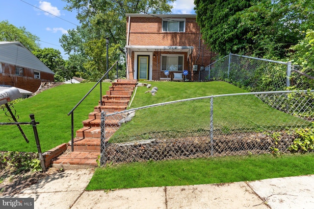 view of front of property featuring brick siding and stairway
