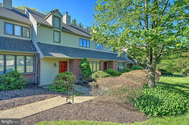 4 Ingham Way, New Hope, PA 18938 - view of front of home featuring a chimney, brick siding, and a shingled roof