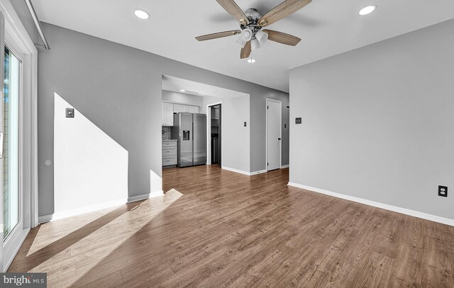 4 Ingham Way, New Hope, PA 18938 - unfurnished living room featuring a ceiling fan, recessed lighting, wood finished floors, and baseboards
