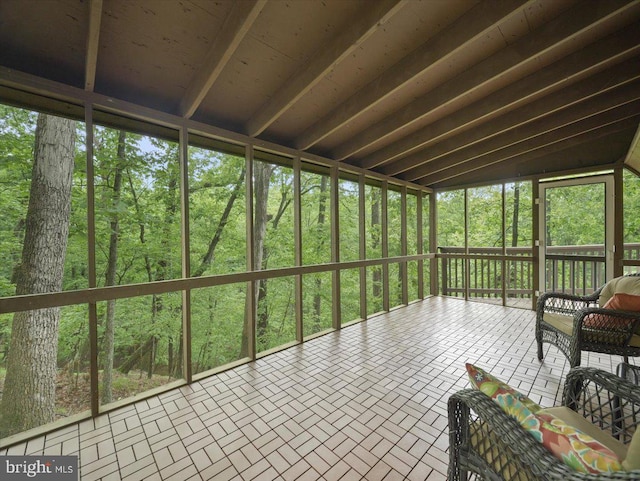 106 Monacan Trl, Hedgesville, WV 25427 - sunroom / solarium featuring a forest view
