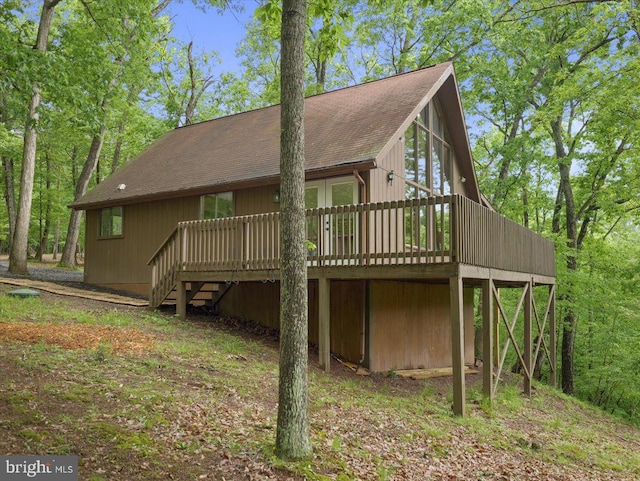106 Monacan Trl, Hedgesville, WV 25427 - rear view of property with a deck and a shingled roof