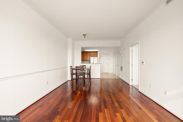 11710 Old Georgetown Rd Unit 1504, North Bethesda, MD 20852 - unfurnished room featuring wood finished floors, ornamental molding, and baseboards