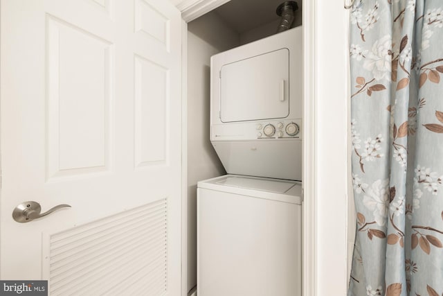 11710 Old Georgetown Rd Unit 1504, North Bethesda, MD 20852 - washroom with stacked washer / dryer