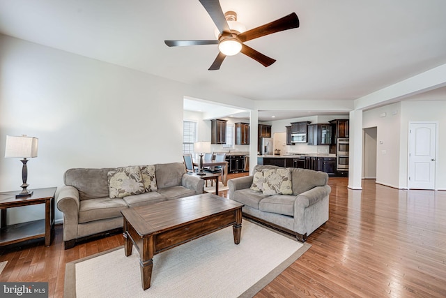 14762 Bell Tower Rd, Woodbridge, VA 22193 - living area featuring a ceiling fan and light wood finished floors
