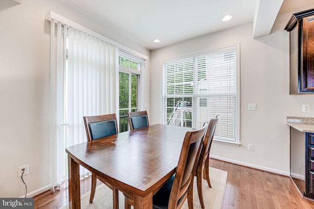 14762 Bell Tower Rd, Woodbridge, VA 22193 - dining room with light wood-style floors, baseboards, and recessed lighting