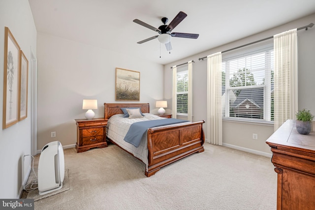 14762 Bell Tower Rd, Woodbridge, VA 22193 - bedroom featuring light colored carpet, baseboards, and a ceiling fan