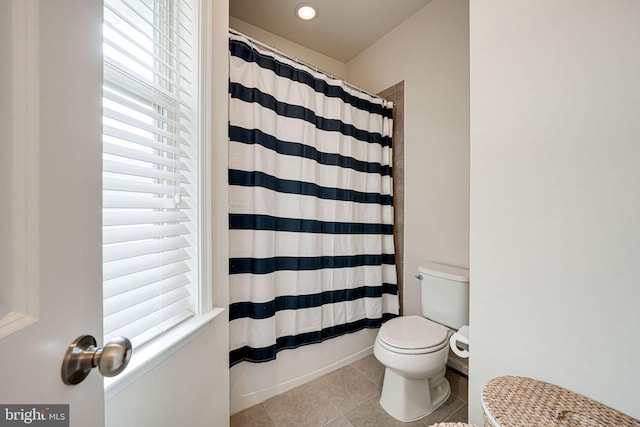 14762 Bell Tower Rd, Woodbridge, VA 22193 - full bathroom featuring healthy amount of natural light, tile patterned floors, a shower with curtain, and toilet