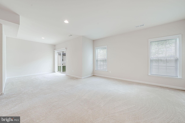14762 Bell Tower Rd, Woodbridge, VA 22193 - empty room with plenty of natural light, baseboards, light colored carpet, and recessed lighting