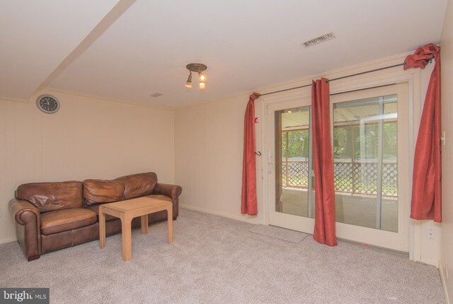 5941 Plumwood Ln, Woodbridge, VA 22193 - carpeted living area with ornamental molding and baseboards