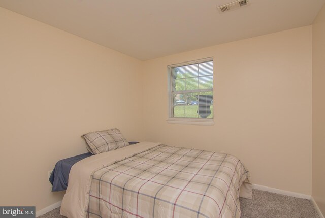 5941 Plumwood Ln, Woodbridge, VA 22193 - carpeted bedroom featuring baseboards