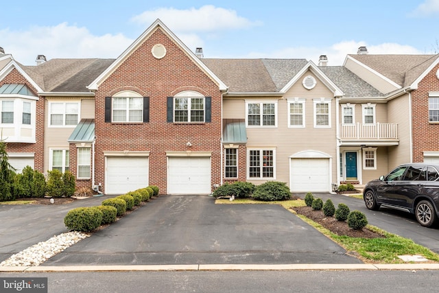171 Timothy Cir, Wayne, PA 19087 - multi unit property with driveway, brick siding, an attached garage, and a chimney