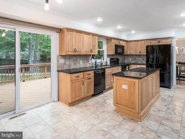 1004 England Dr, Stafford, VA 22554 - kitchen featuring black appliances, a sink, plenty of natural light, crown molding, and decorative backsplash