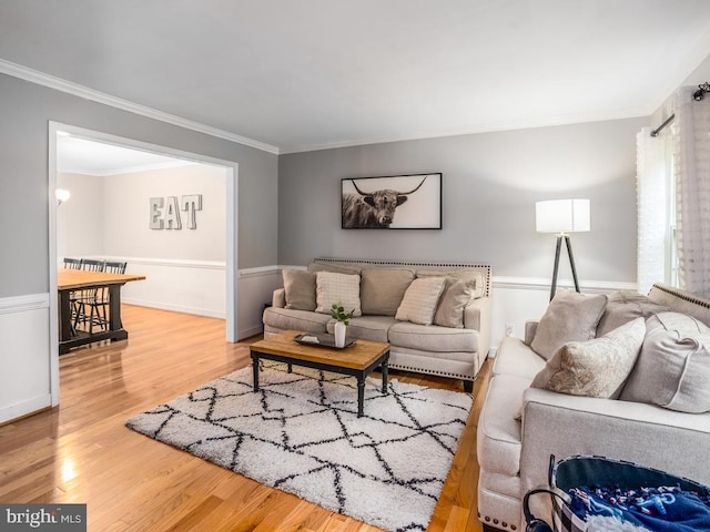 1004 England Dr, Stafford, VA 22554 - living area with ornamental molding, wood finished floors, and baseboards