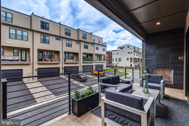 balcony with a residential view and outdoor lounge area