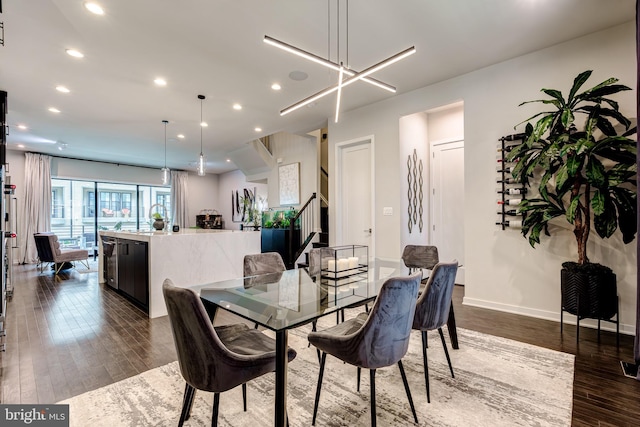 dining room featuring dark wood-style flooring, stairway, recessed lighting, and baseboards