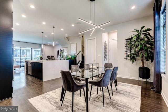 dining room featuring dark wood-style floors, stairway, recessed lighting, and baseboards