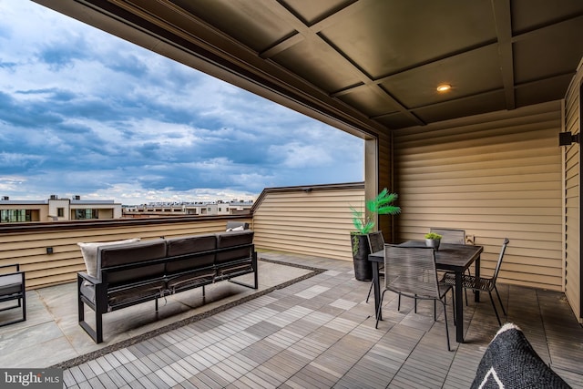 view of patio featuring outdoor dining area