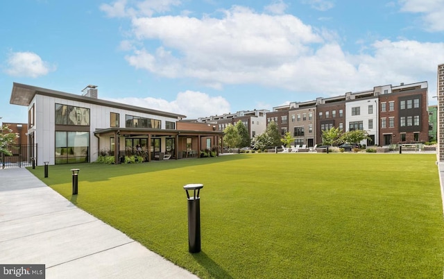 view of community featuring a lawn