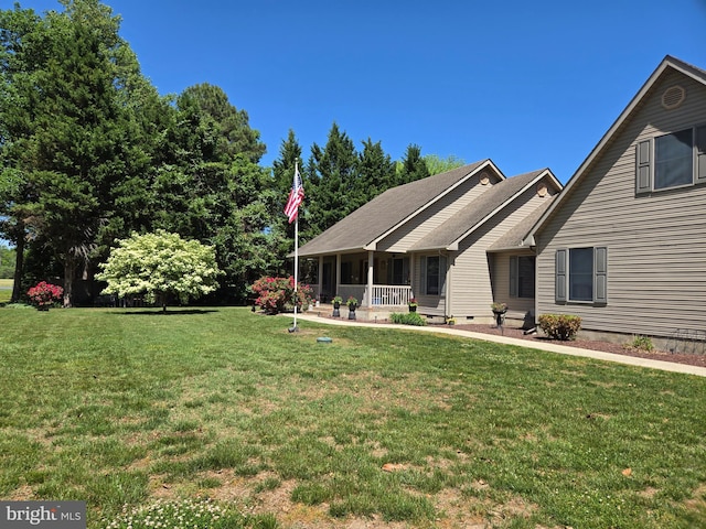 105 Woodview Dr, Harrington, DE 19952 - view of front facade featuring a front yard and covered porch