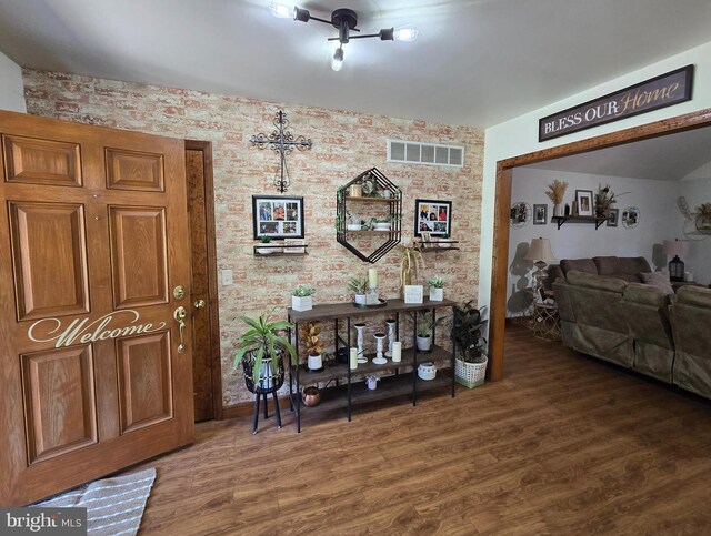 105 Woodview Dr, Harrington, DE 19952 - hallway featuring wood finished floors and wallpapered walls