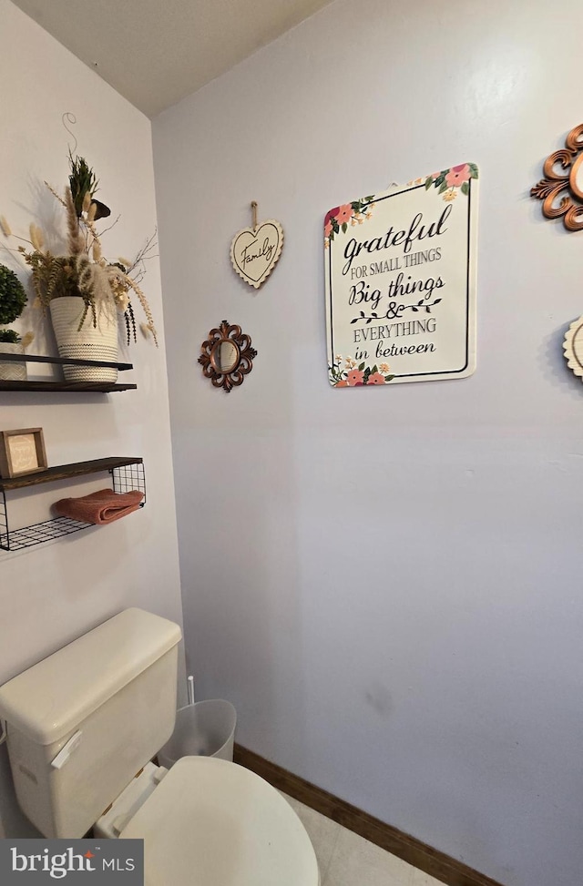 105 Woodview Dr, Harrington, DE 19952 - bathroom featuring baseboards and toilet