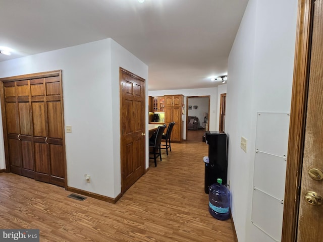 105 Woodview Dr, Harrington, DE 19952 - hall featuring wood finished floors and baseboards