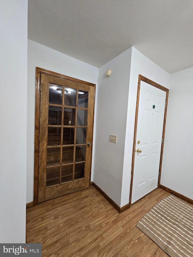 105 Woodview Dr, Harrington, DE 19952 - entryway featuring baseboards and wood finished floors