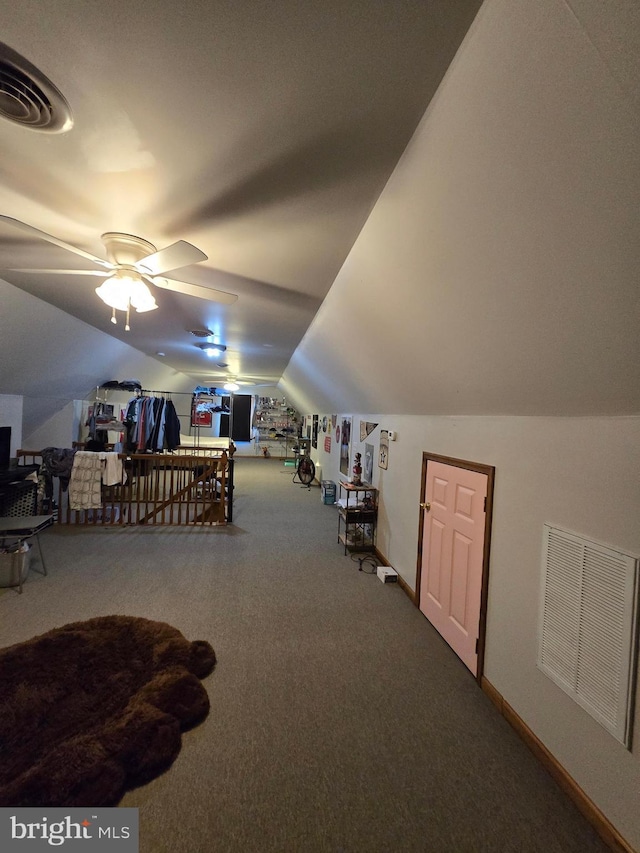 105 Woodview Dr, Harrington, DE 19952 - carpeted bedroom with vaulted ceiling and baseboards