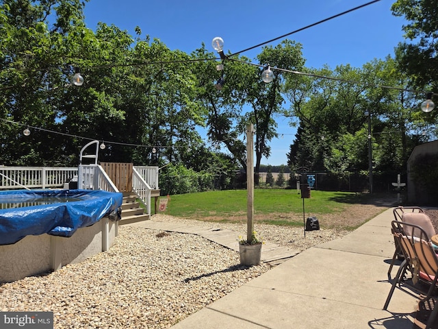 105 Woodview Dr, Harrington, DE 19952 - view of yard with a covered pool and a patio area