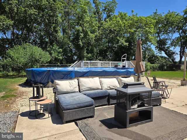 105 Woodview Dr, Harrington, DE 19952 - view of patio / terrace featuring a covered pool and outdoor lounge area