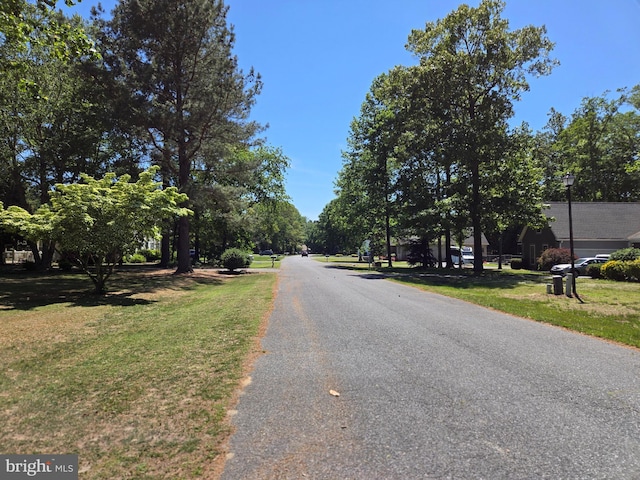 105 Woodview Dr, Harrington, DE 19952 - view of asphalt street with street lights