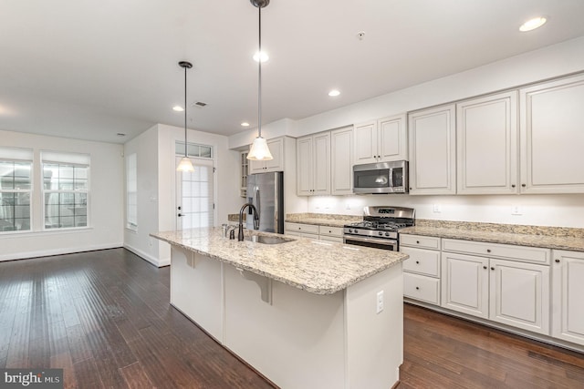 1427 Chanery Ct, Odenton, MD 21113 - kitchen featuring appliances with stainless steel finishes, a kitchen island with sink, dark wood-style floors, white cabinets, and recessed lighting