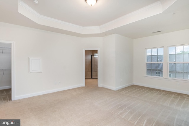 1427 Chanery Ct, Odenton, MD 21113 - spare room featuring a raised ceiling, light colored carpet, crown molding, and baseboards